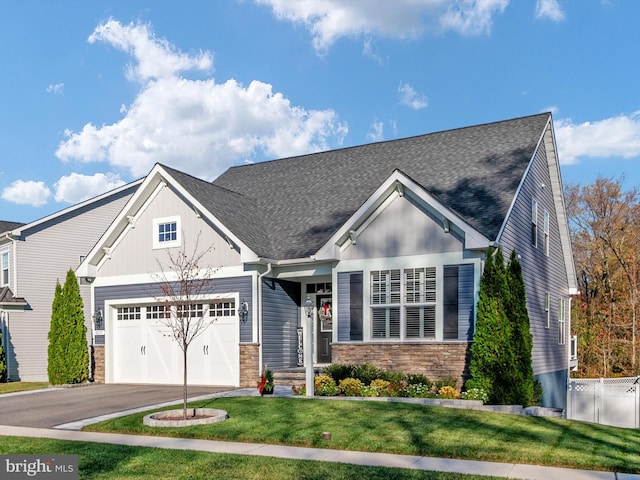 craftsman-style house with a front yard