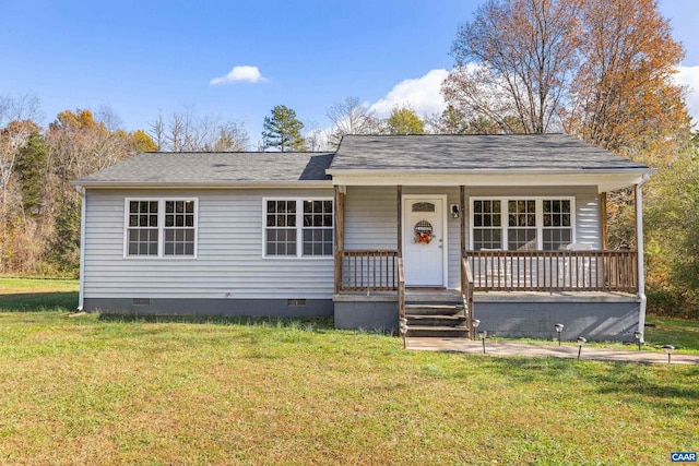 view of front of home featuring covered porch and a front yard