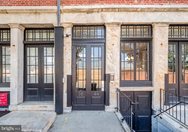 entrance to property featuring french doors