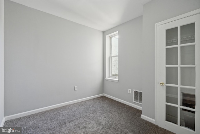 view of carpeted spare room