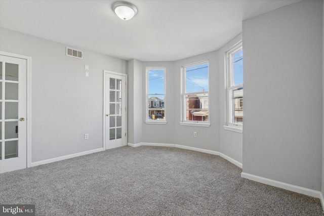 spare room with carpet flooring