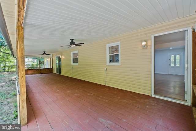 wooden deck with ceiling fan