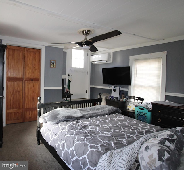 bedroom with ceiling fan, carpet, and a wall mounted air conditioner