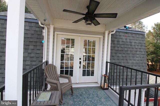 balcony with ceiling fan and french doors