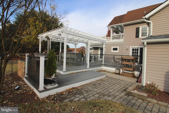 view of patio / terrace with a pergola and a wooden deck