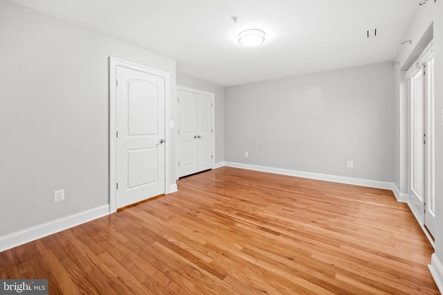 unfurnished bedroom featuring light hardwood / wood-style floors