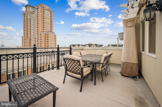 view of patio / terrace with a balcony