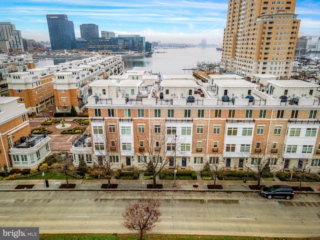 property's view of city with a water view