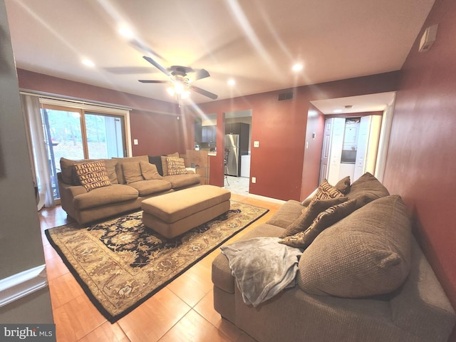 living room with ceiling fan