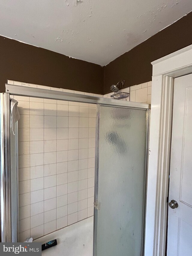 bathroom featuring walk in shower