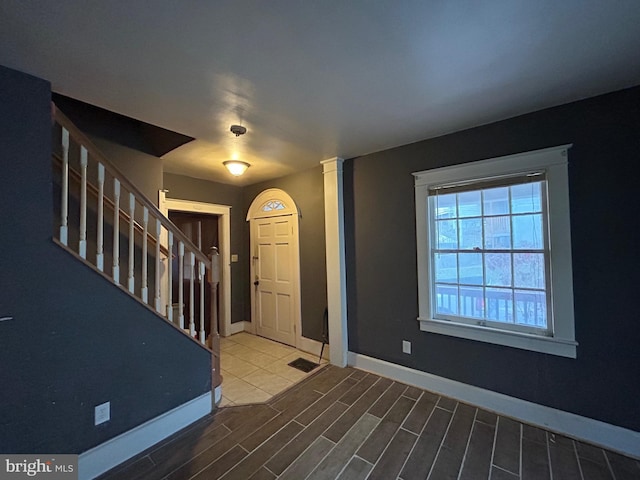 foyer featuring wood-type flooring