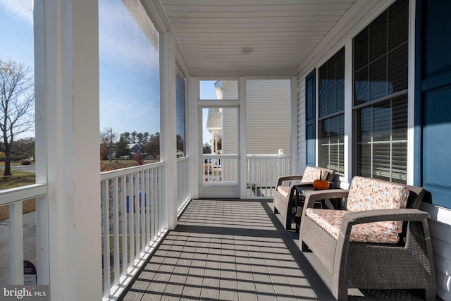 balcony featuring covered porch