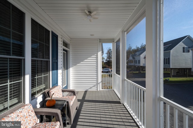 balcony featuring ceiling fan