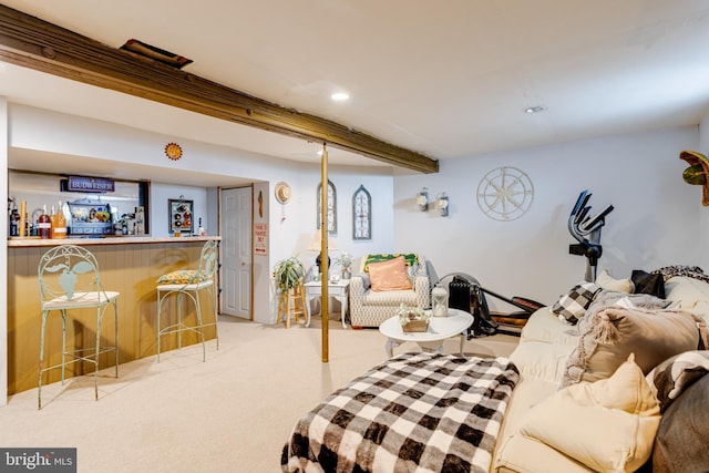 living room with bar area and light colored carpet