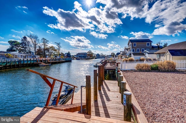 dock area featuring a water view