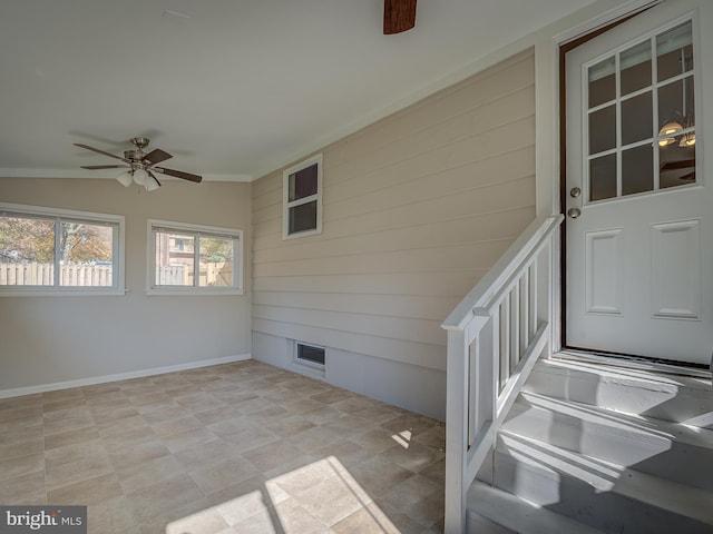 unfurnished sunroom with lofted ceiling