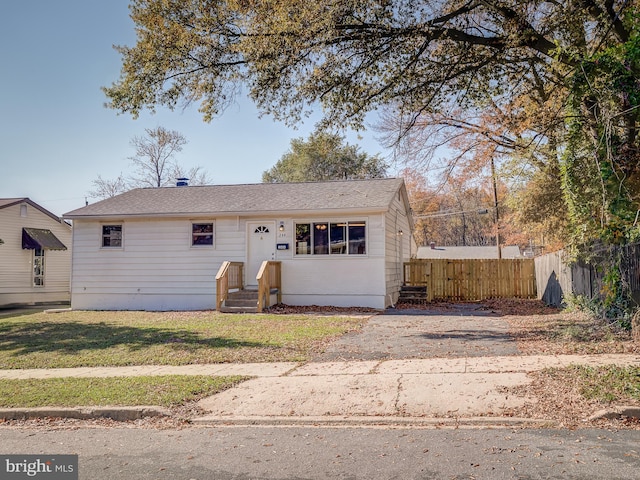 view of front of home with a front yard