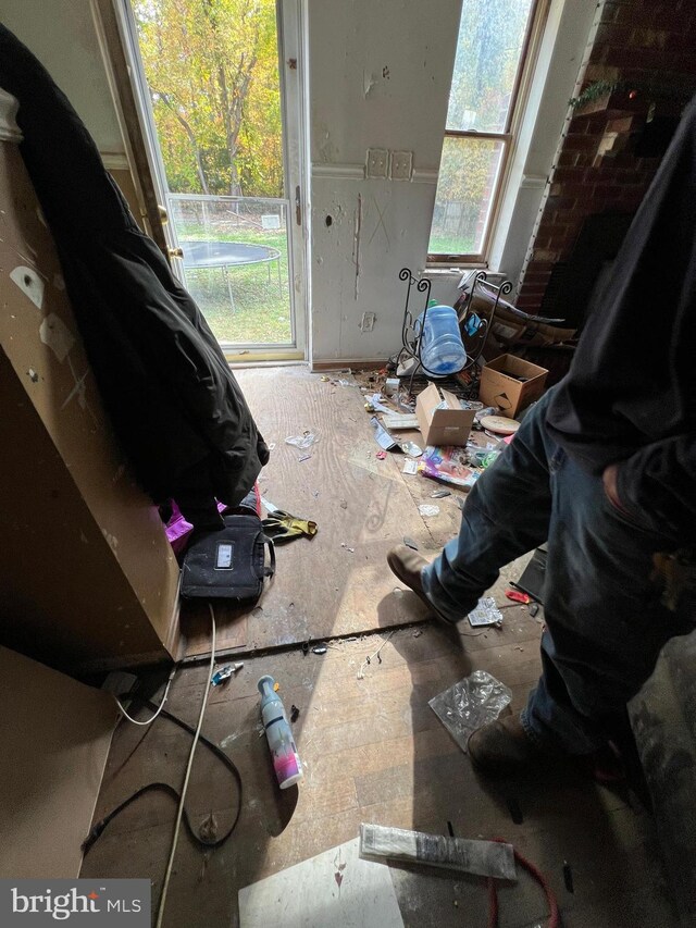 94 Pine Rd, Pasadena, MD 21122 - interior space featuring multiple windows and access to outside