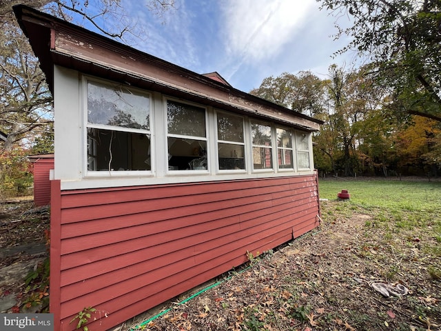 94 Pine Rd, Pasadena, MD 21122 - view of property exterior featuring a yard