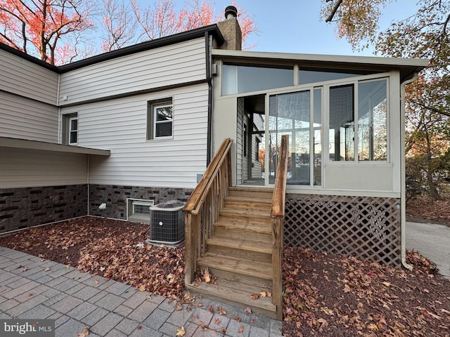 exterior space with central air condition unit