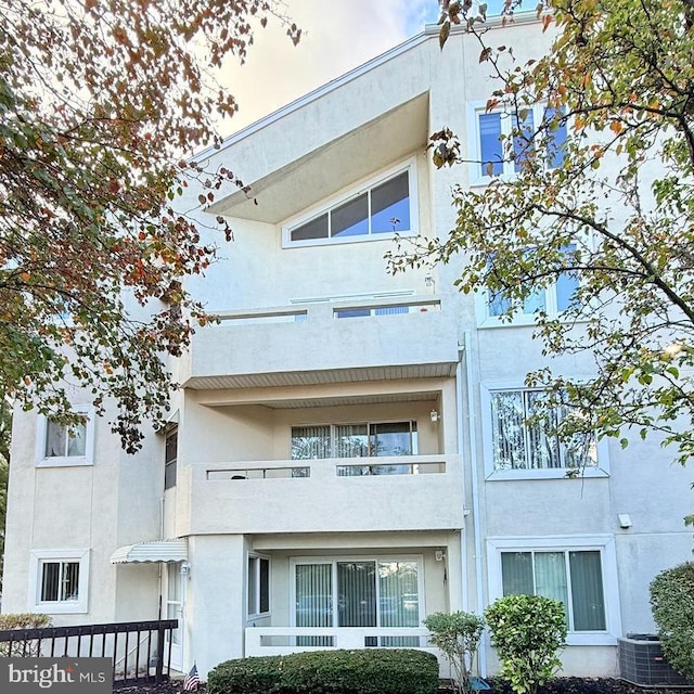 view of property featuring cooling unit