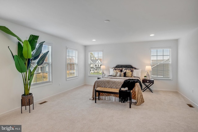bedroom with carpet, recessed lighting, and baseboards