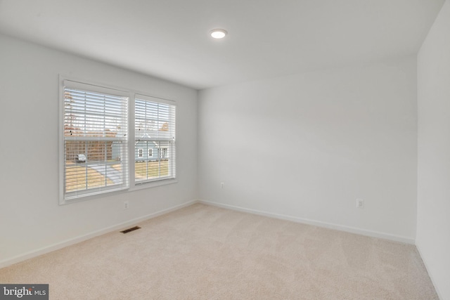 view of carpeted spare room