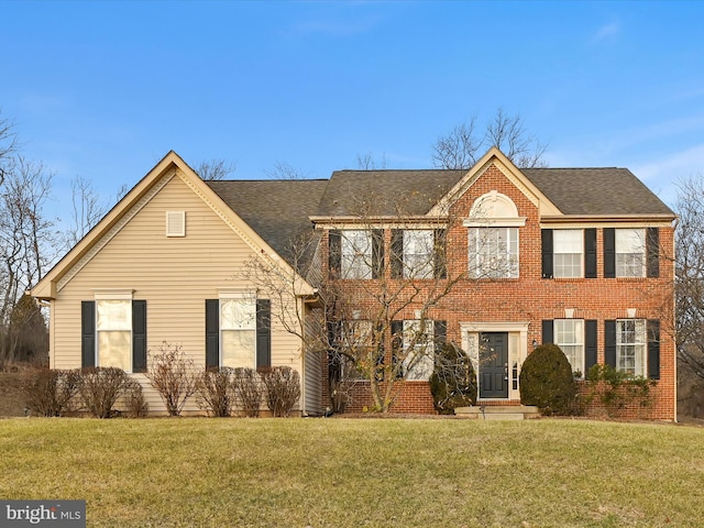 view of front of home with a front yard