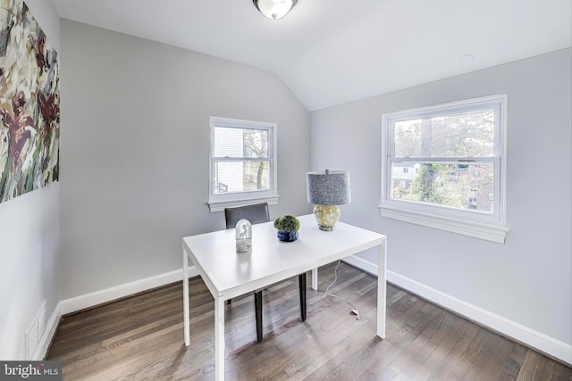 office featuring plenty of natural light, lofted ceiling, and hardwood / wood-style flooring