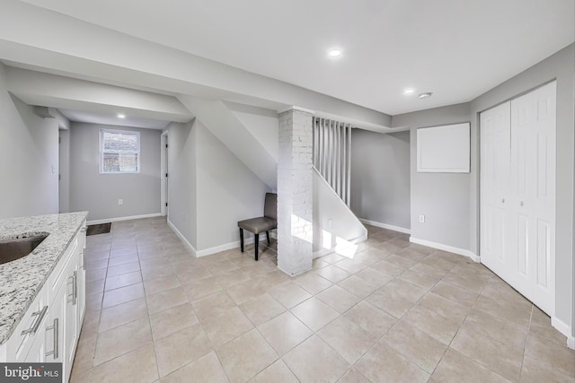 basement with light tile patterned floors