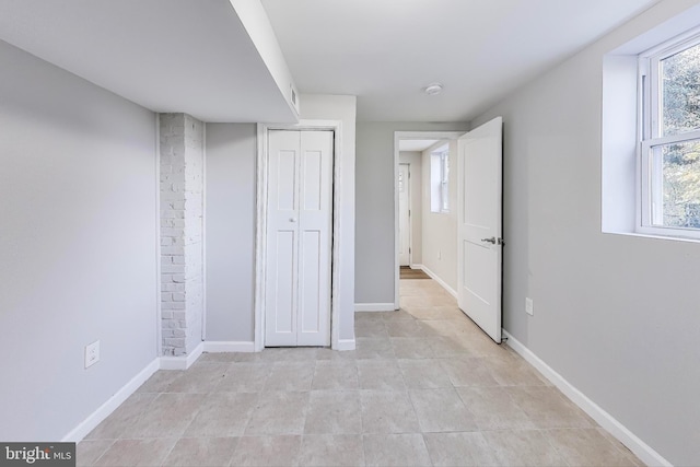 unfurnished bedroom with a closet