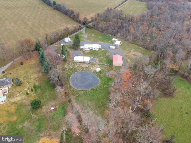 birds eye view of property featuring a rural view