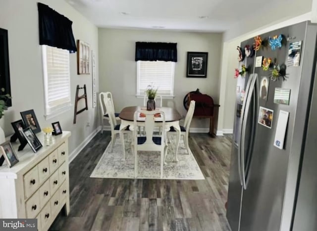 dining room featuring dark wood-type flooring