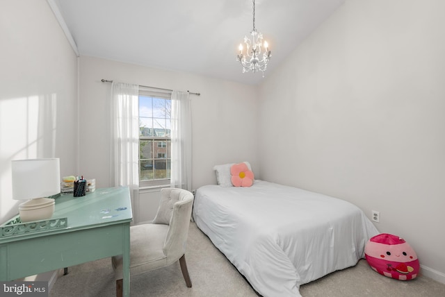 bedroom featuring carpet, a chandelier, and lofted ceiling