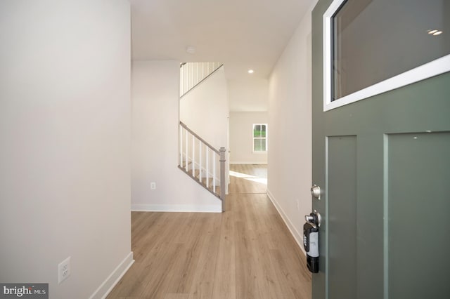 foyer with light hardwood / wood-style floors