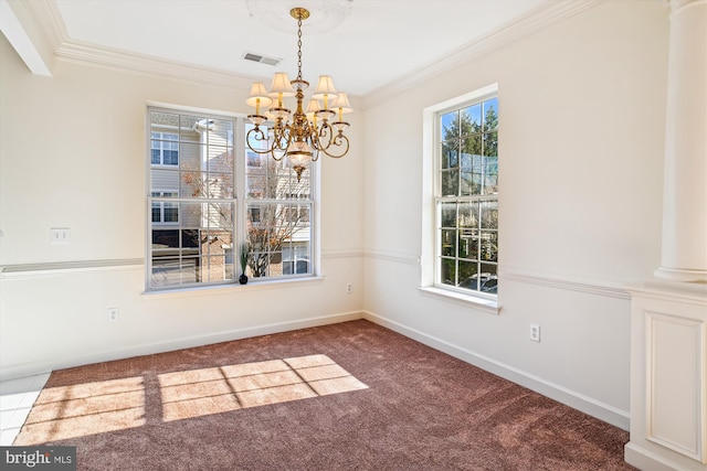 unfurnished dining area featuring carpet, ornamental molding, and a chandelier