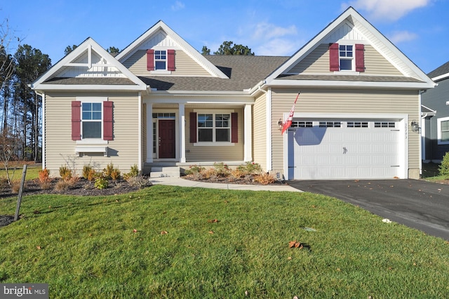 craftsman-style home with a front yard