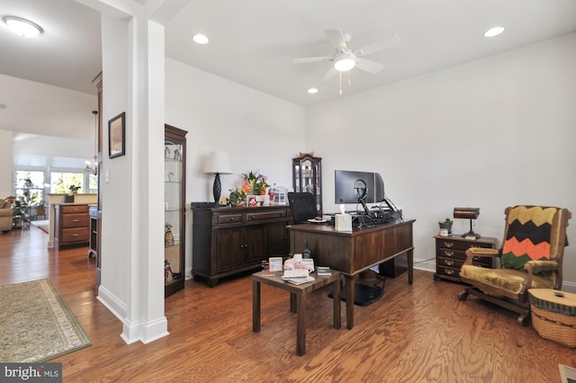 office with hardwood / wood-style floors and ceiling fan