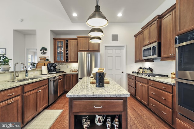 30773 Fowlers Path, Millsboro, DE 19966 - kitchen with a sink, appliances with stainless steel finishes, tasteful backsplash, dark wood-style floors, and glass insert cabinets