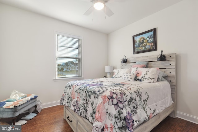 bedroom featuring ceiling fan and dark hardwood / wood-style floors