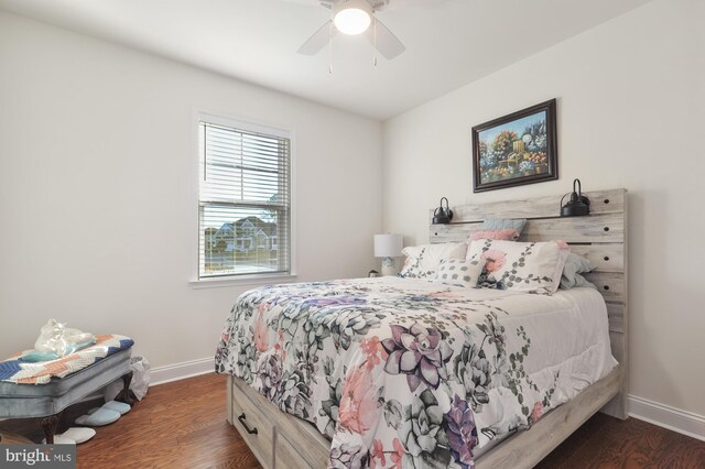 30773 Fowlers Path, Millsboro, DE 19966 - bedroom featuring baseboards, dark wood-style flooring, and a ceiling fan