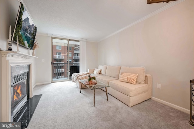 carpeted living room featuring ornamental molding and a textured ceiling