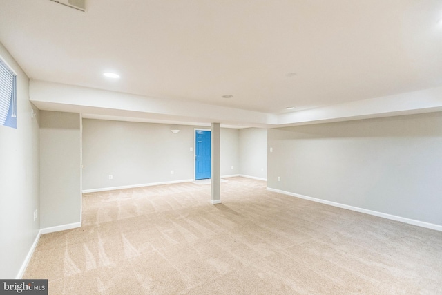 basement with light colored carpet