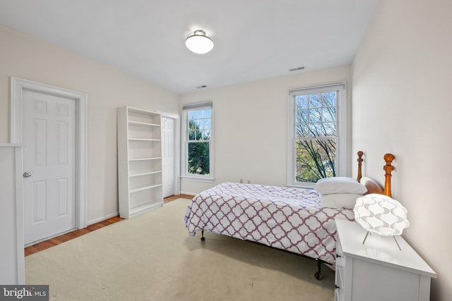 bedroom featuring light wood-type flooring