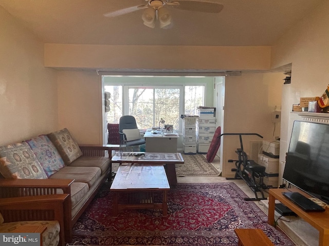 living room featuring ceiling fan