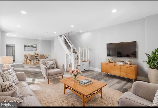 living room with light hardwood / wood-style floors