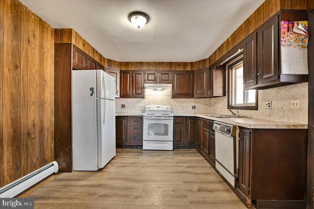 kitchen featuring dark brown cabinetry, light hardwood / wood-style floors, sink, white appliances, and a baseboard radiator