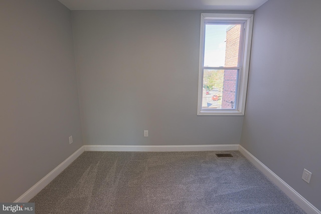 empty room featuring carpet