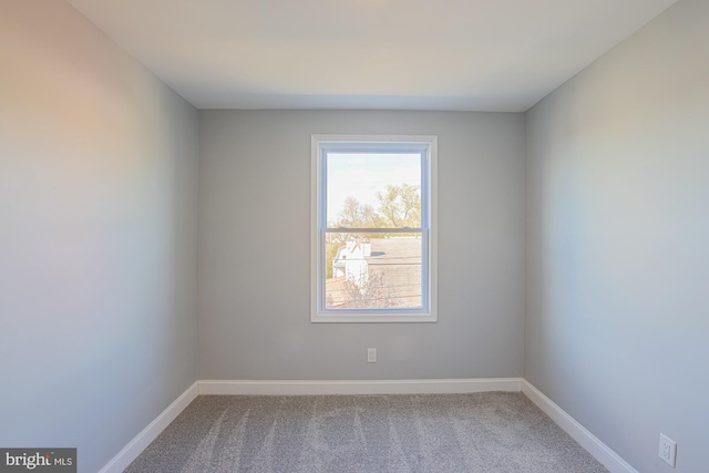 unfurnished room with carpet floors