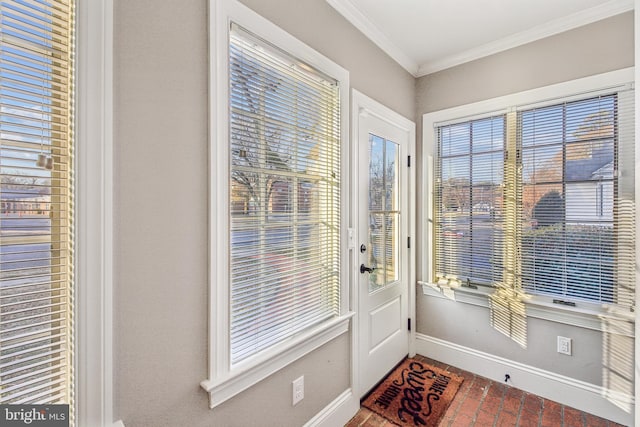 doorway featuring ornamental molding